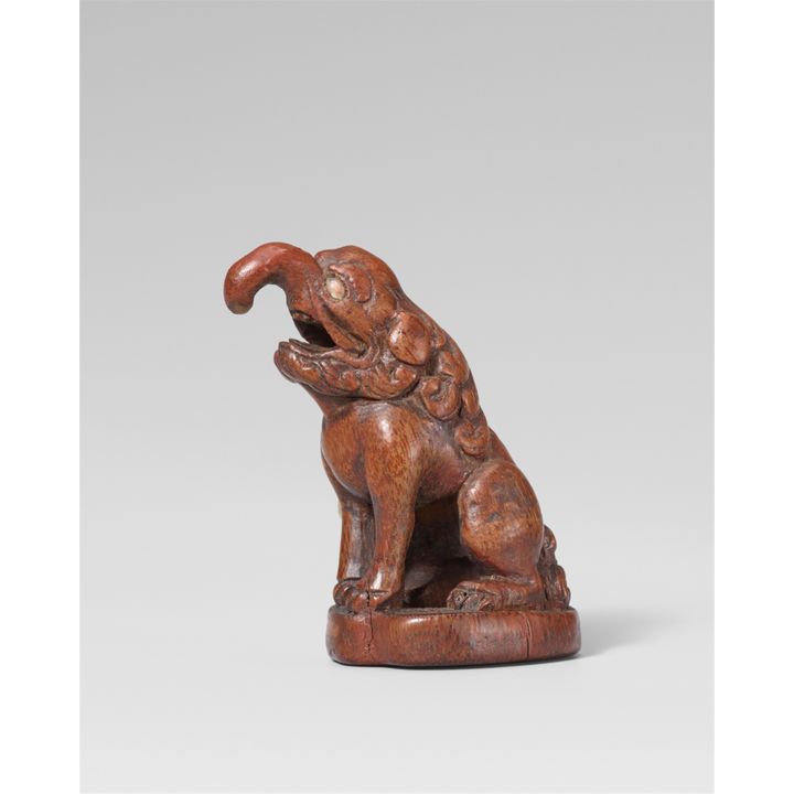 An uncommon bamboo root netsuke of a baku. 18th/19th century