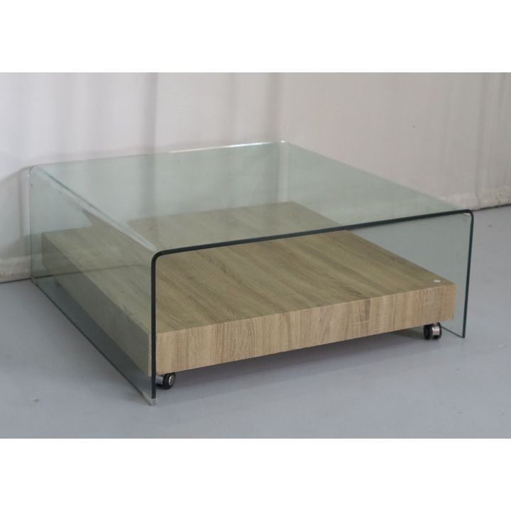 CORICRAFT GLASS COFFEE TABLE WITH WHEELED WOODEN BASE