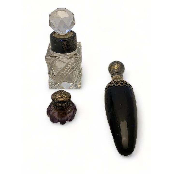 Two Victorian silver topped scent bottles and a small salts bottle
