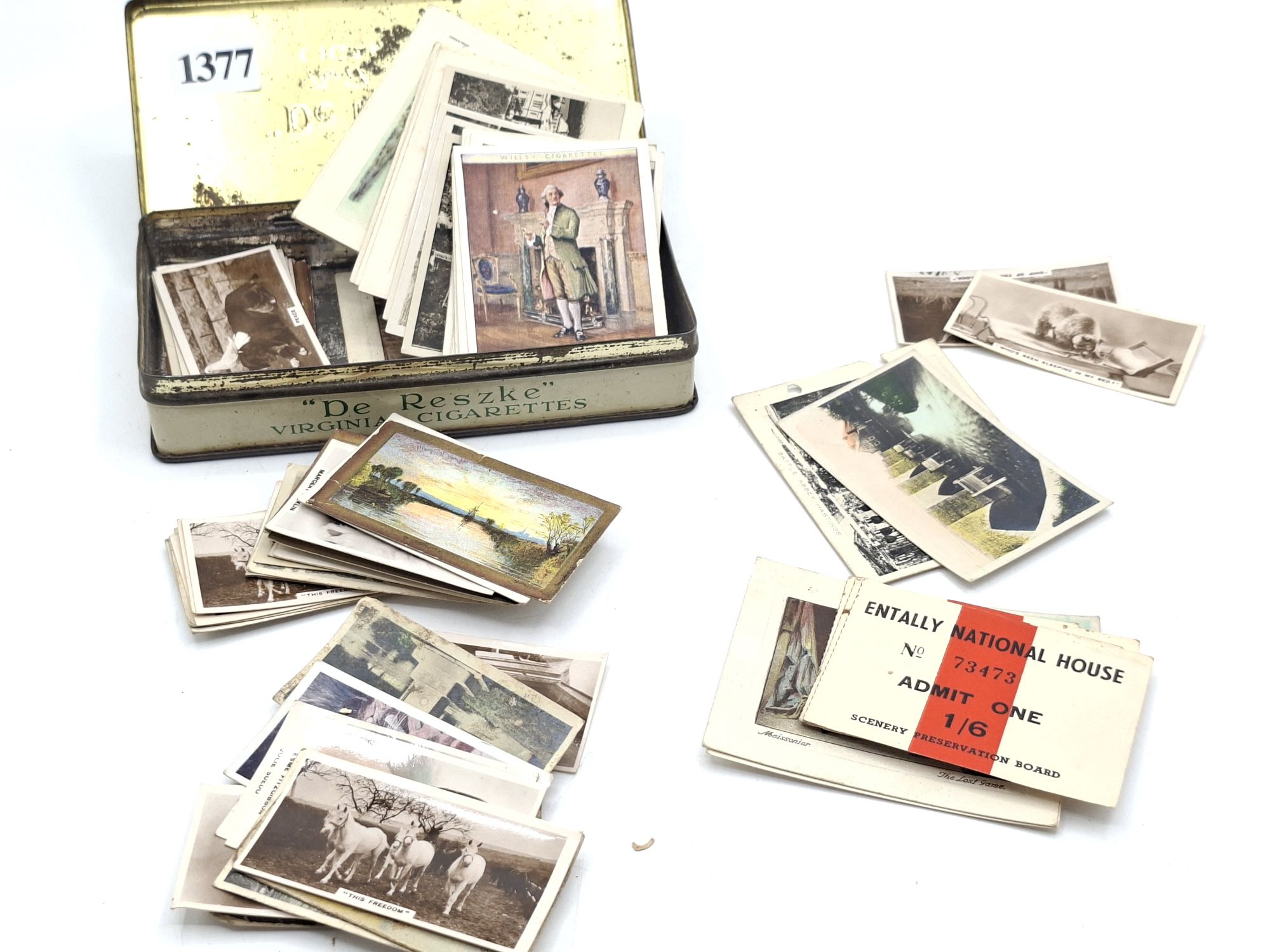 1377 · TOBACCO TIN WITH CIGARETTE CARDS