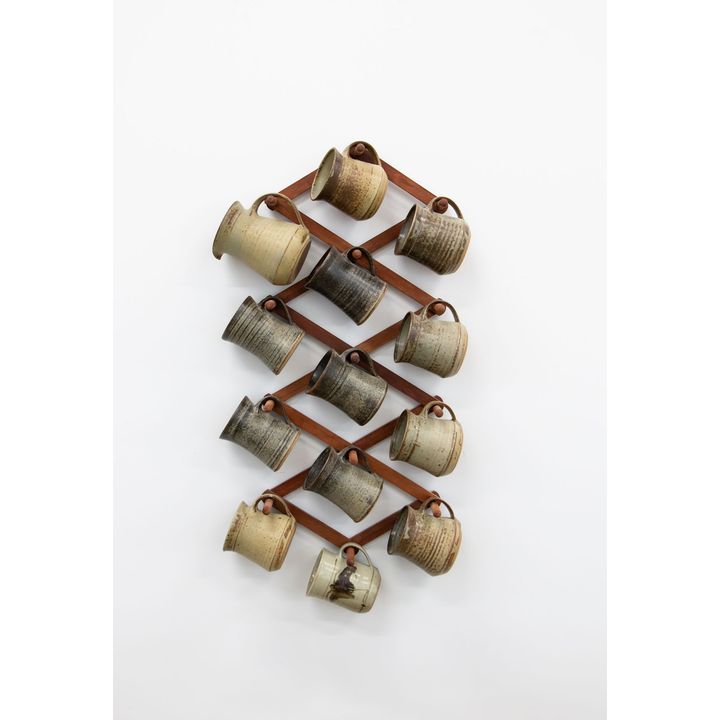 Jack Laird - A collection of twelve stoneware mugs