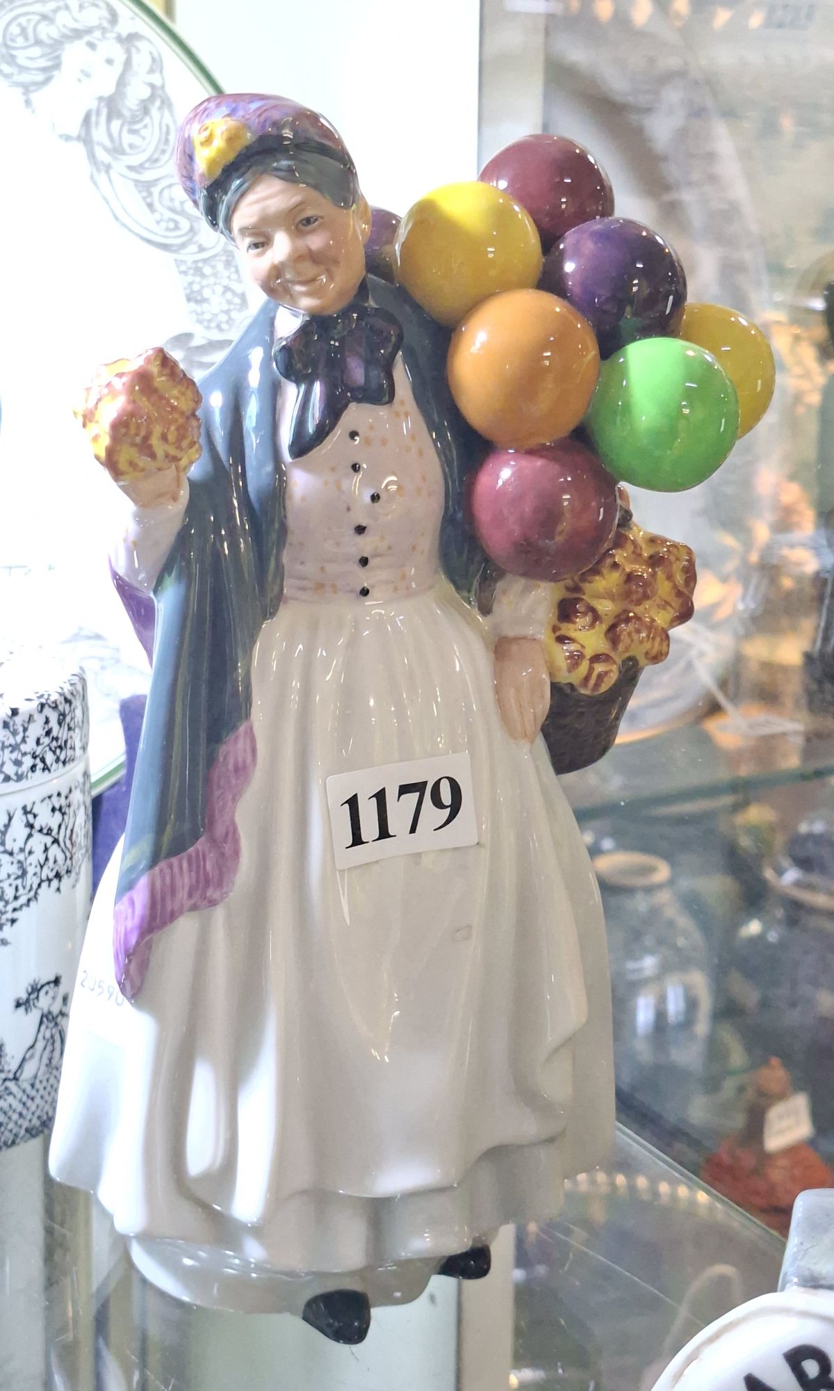 ROYAL DOULTON 'BIDDY PENNY FARTHING' FIGURINE