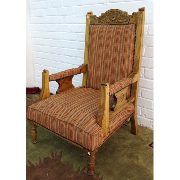 CARVED OAK OPEN ARMCHAIR