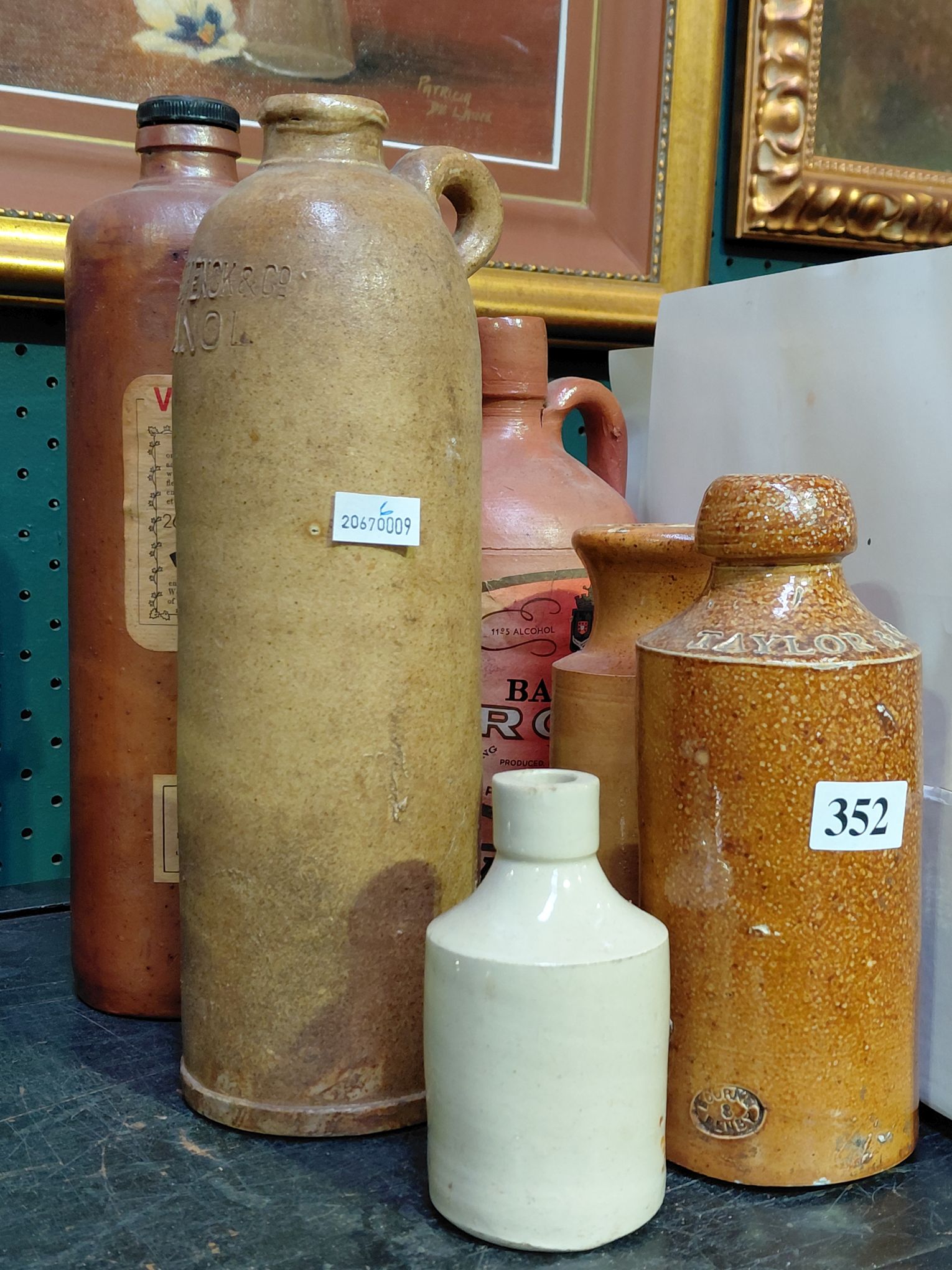 352 · STONEWARE BOTTLE COLLECTION