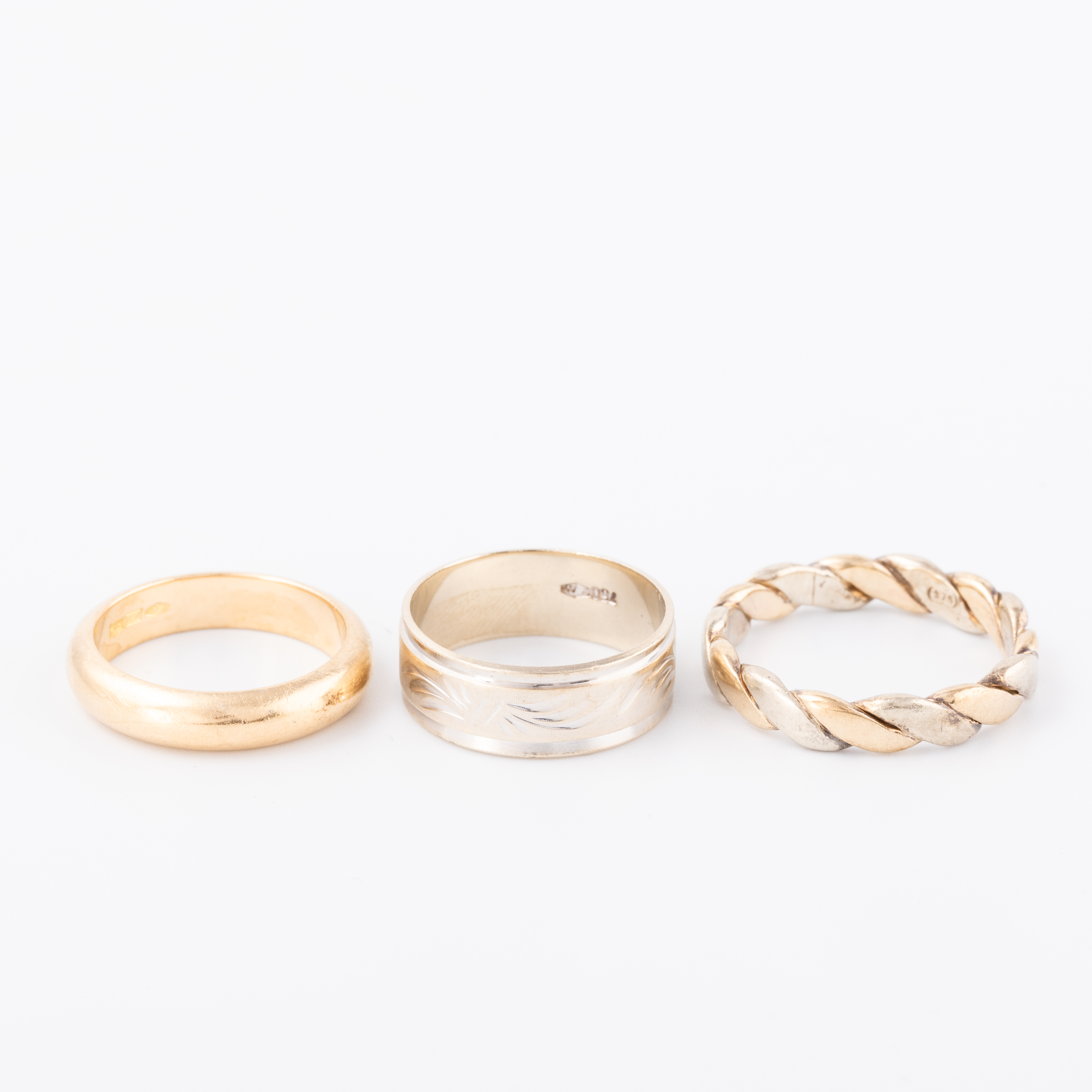 Three Assorted 18ct & 9ct Gold Bands