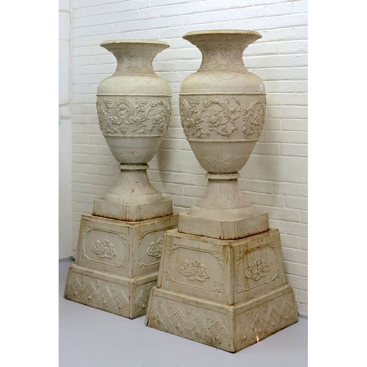 PAIR OF MASSIVE FRENCH CAST IRON VASES ON STANDS