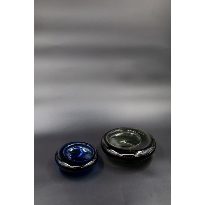 Per Lütken for Holmegaard - A blue tinted blown glass ash tray and a similar smokey glass bowl