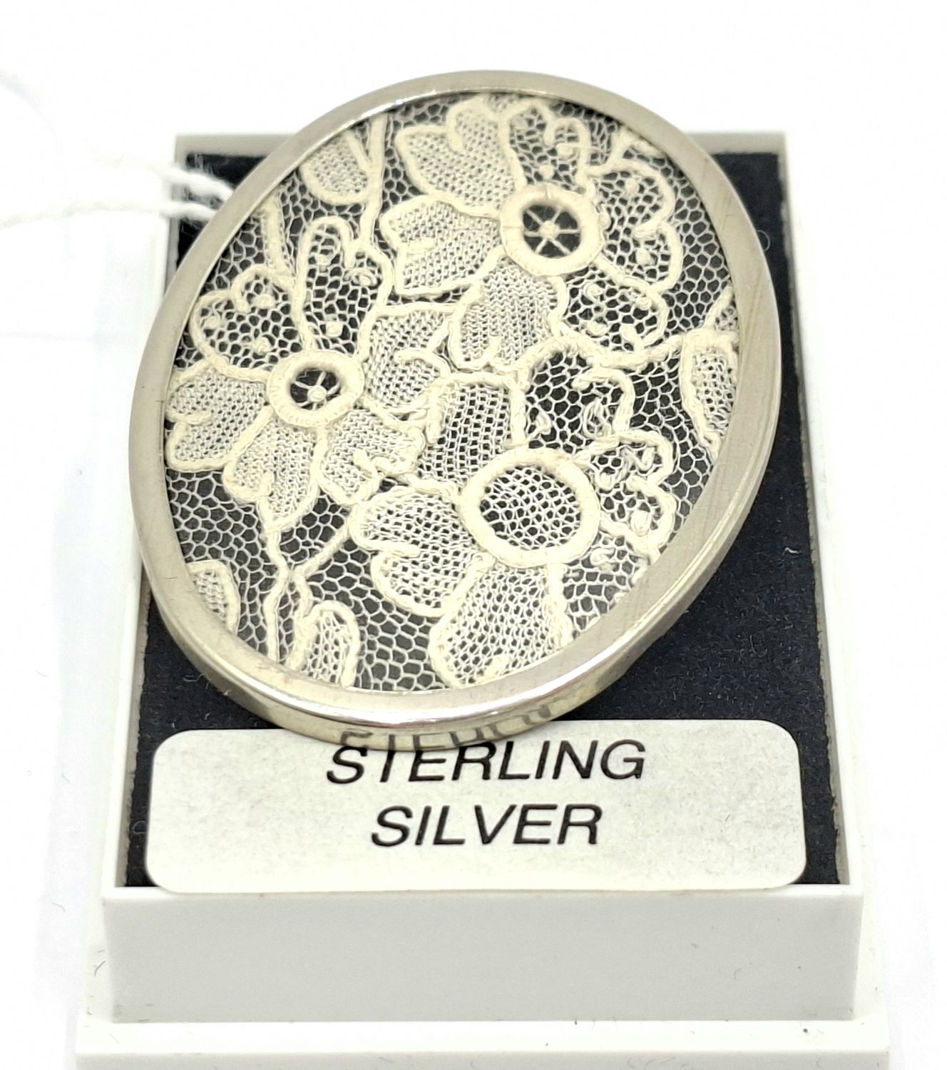 1080 · STERLING SILVER BROOCHES