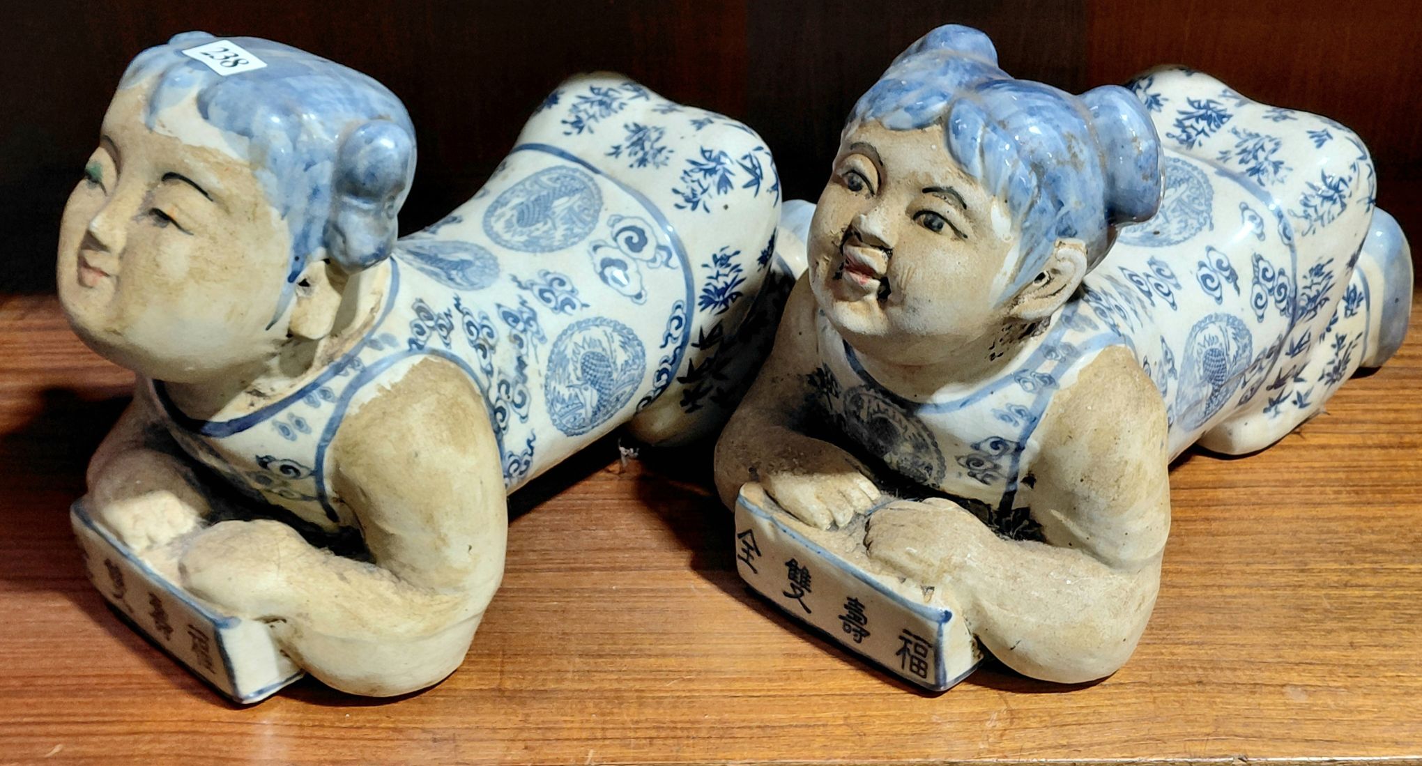 238 · A PAIR OF CHINESE FIGURAL PILLOWS
