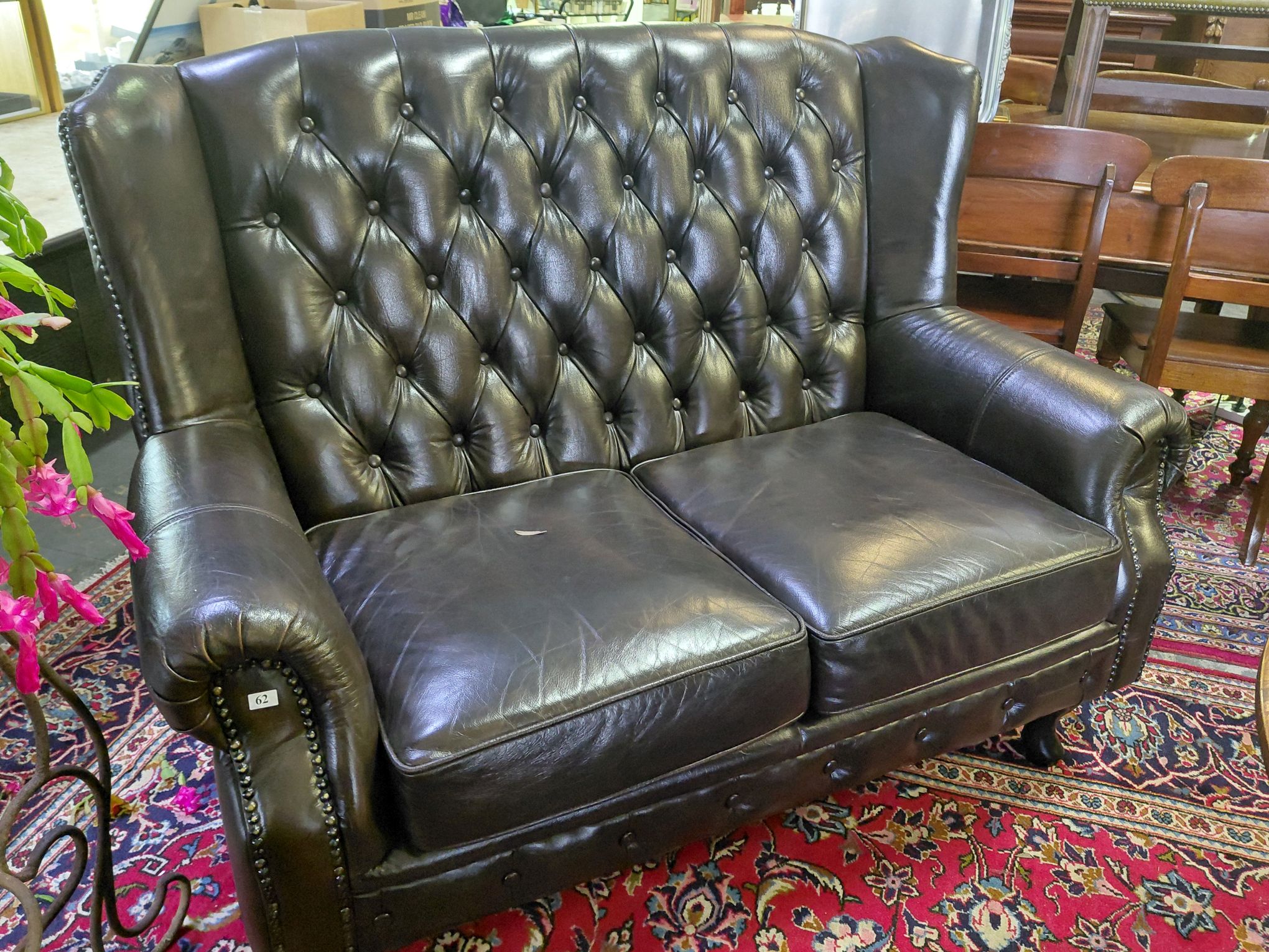 62 · LEATHER 2 SEATER SOFA