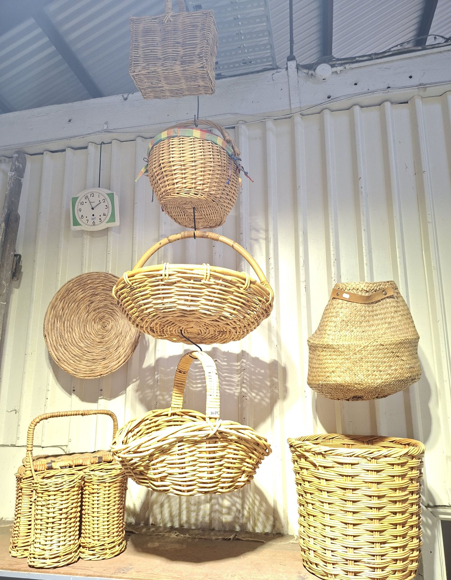 A LARGE GROUP OF WICKER BASKETS