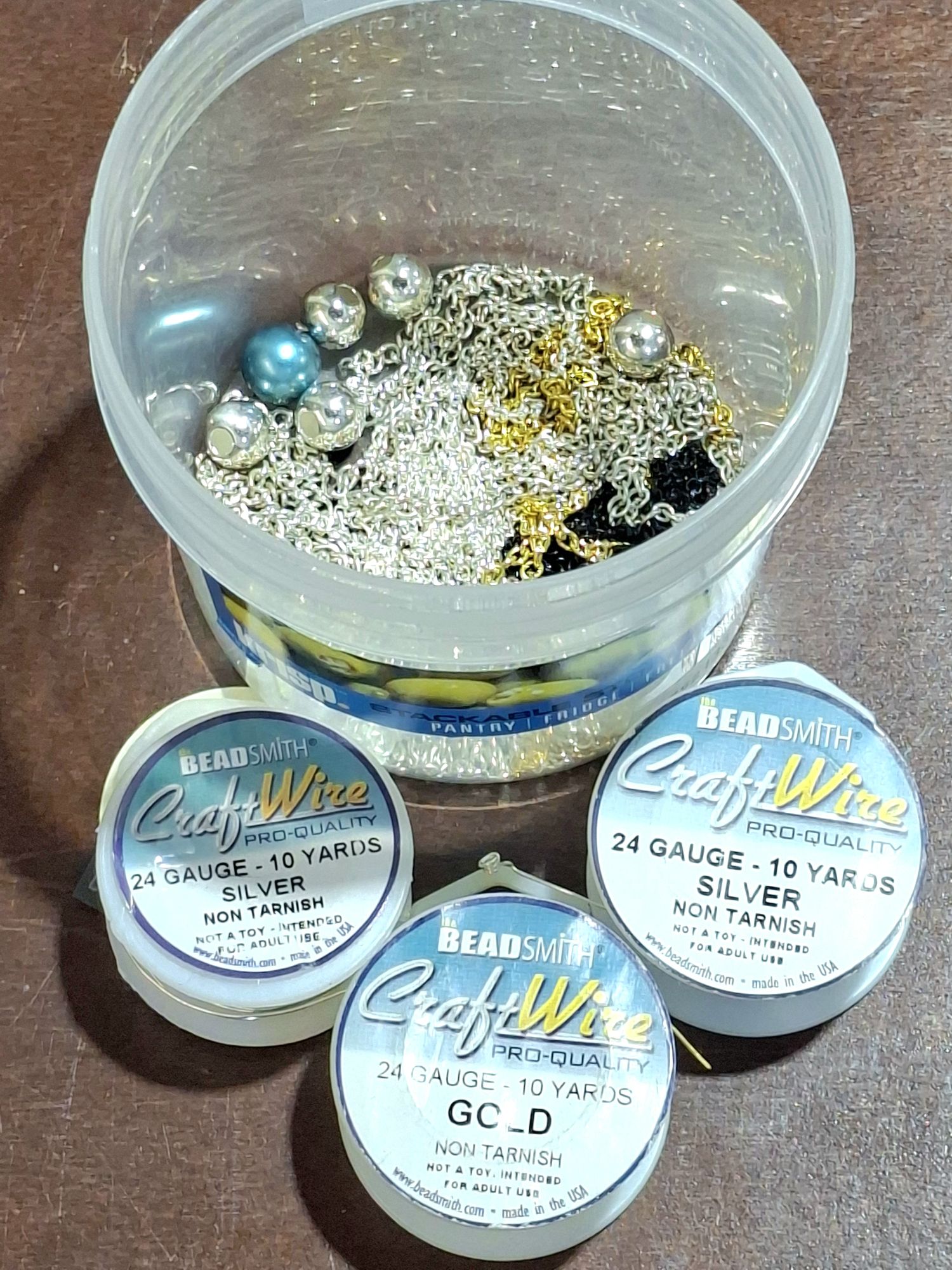 1438 · COLLECTION OF SILVER CHAINS AND WIRE