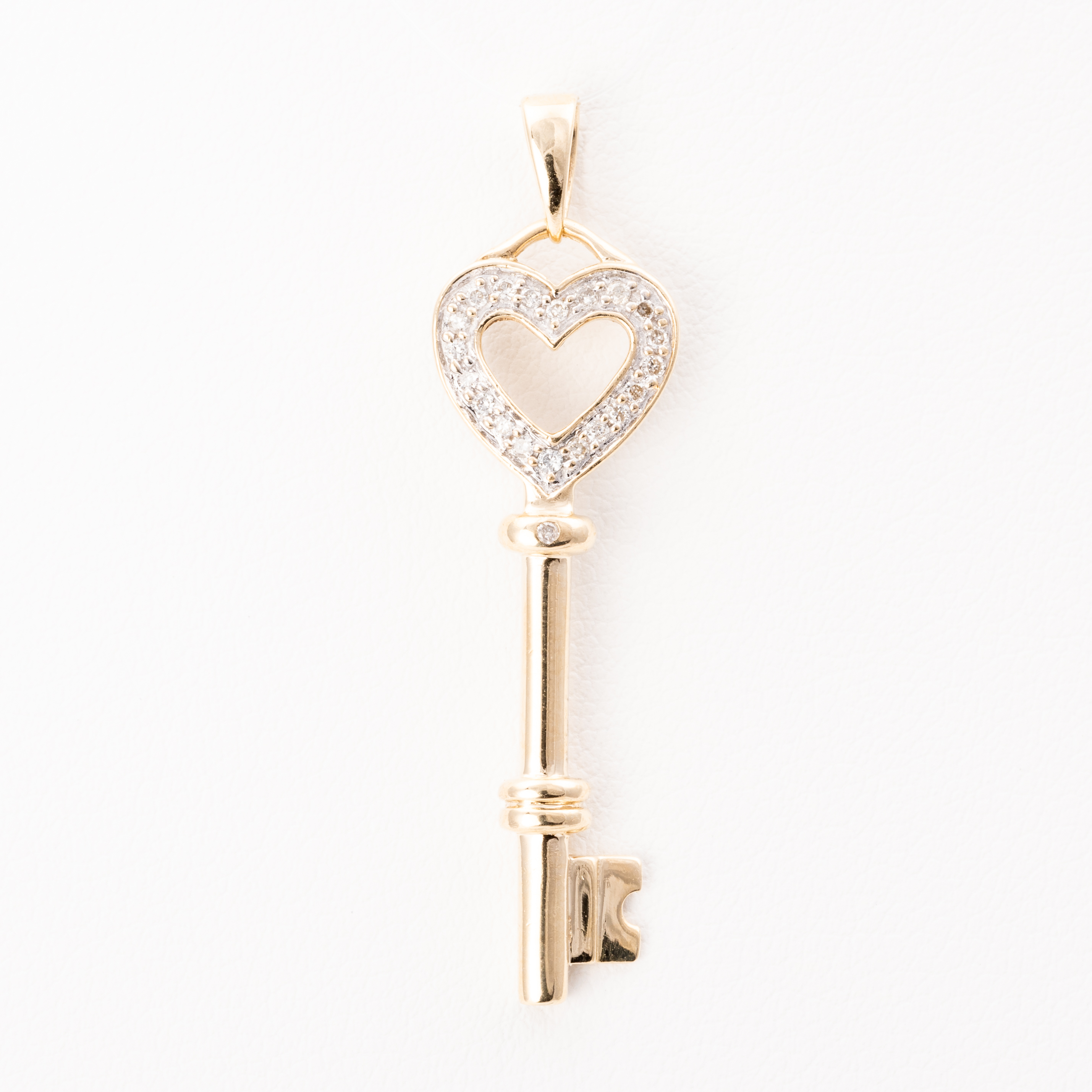 150 · Diamond Key Pendant 9ct Gold