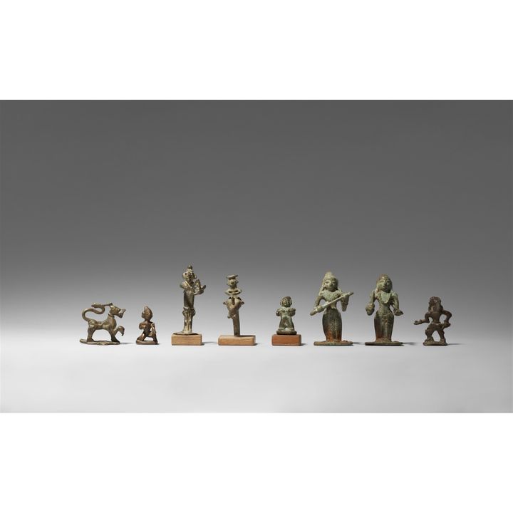 Eight small Indian copper alloy figures. 19th century