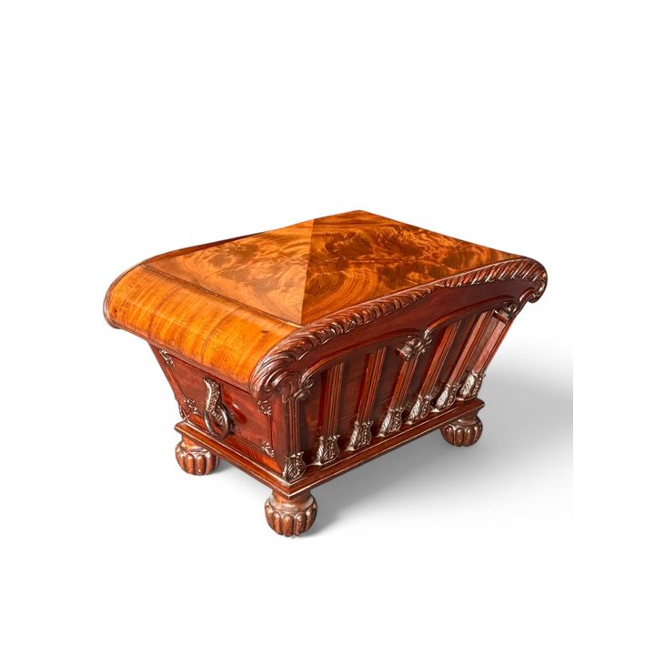 A George IV carved mahogany cellaret attributed to Gillows