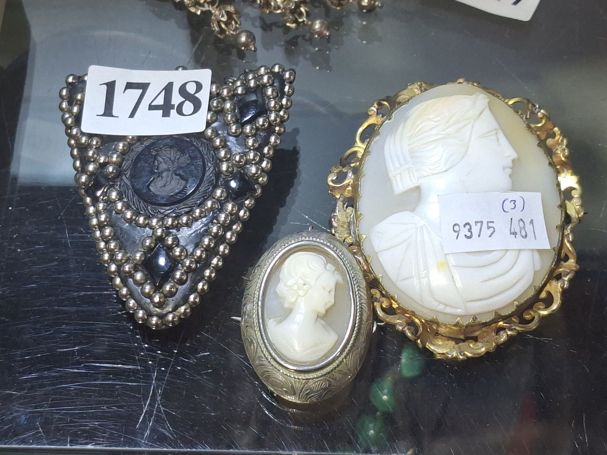 Three Cameo Design Brooches