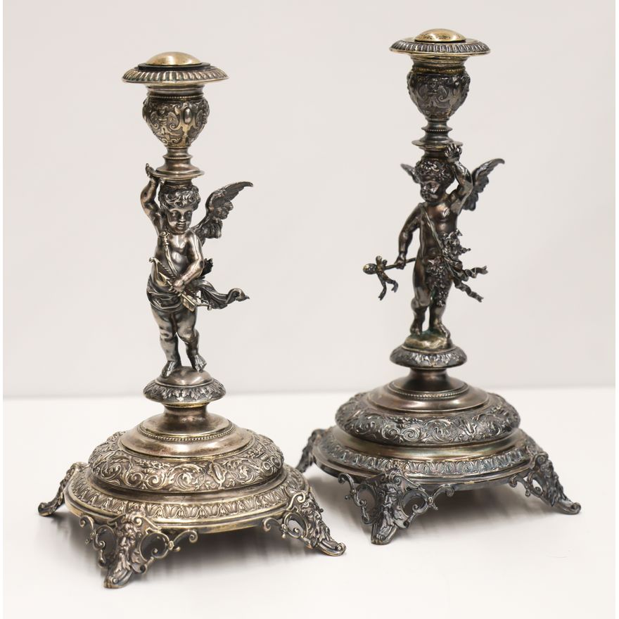 Pair of Ornate German Silver Putto Candlesticks