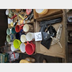 2 Boxes of coffee mugs, BB gun and Cast Iron door knocker