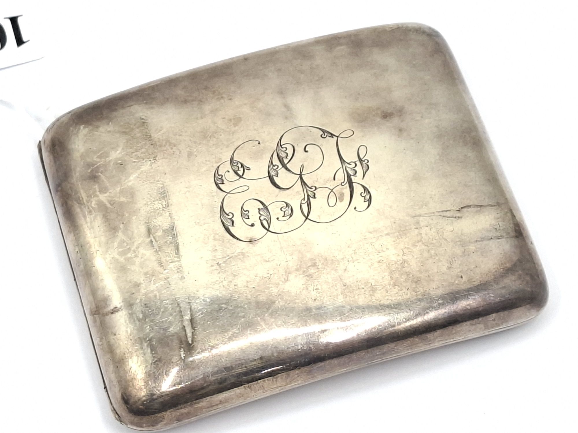 A STERLING SILVER CIGARETTE CASE