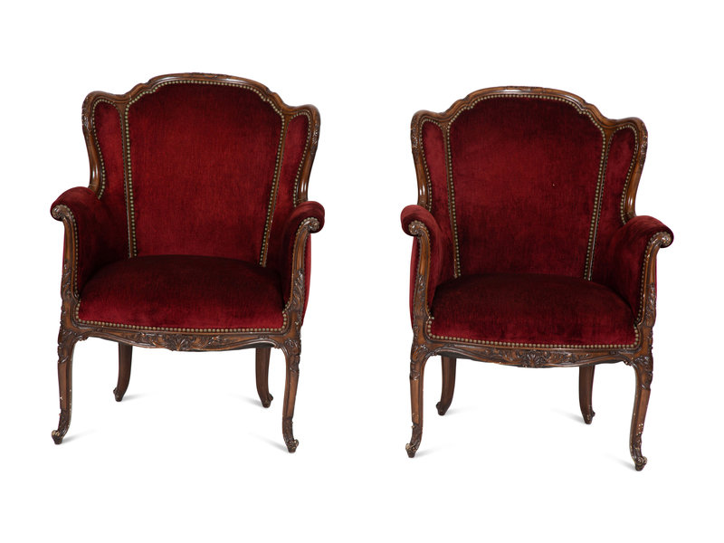 A Pair of Louis XV Style Walnut Bergères 
Height 39 1/4 x width 29 3/8 x depth 27 inches.