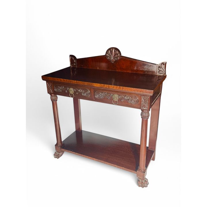 A late 19th century Regency Revival carved mahogany serving table