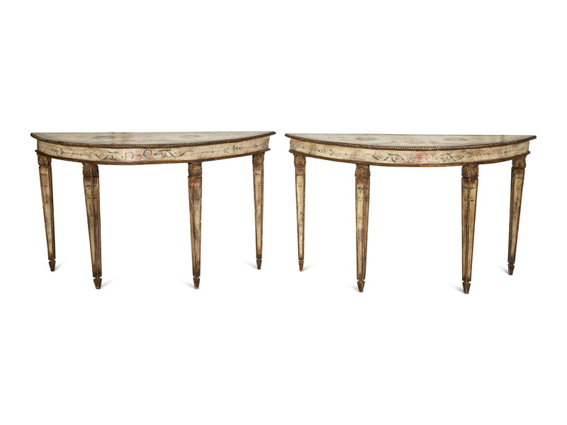 A Pair of Venetian Painted Demilune Console Tables
Height 34 3/8 x width 60 x depth 22 inches.