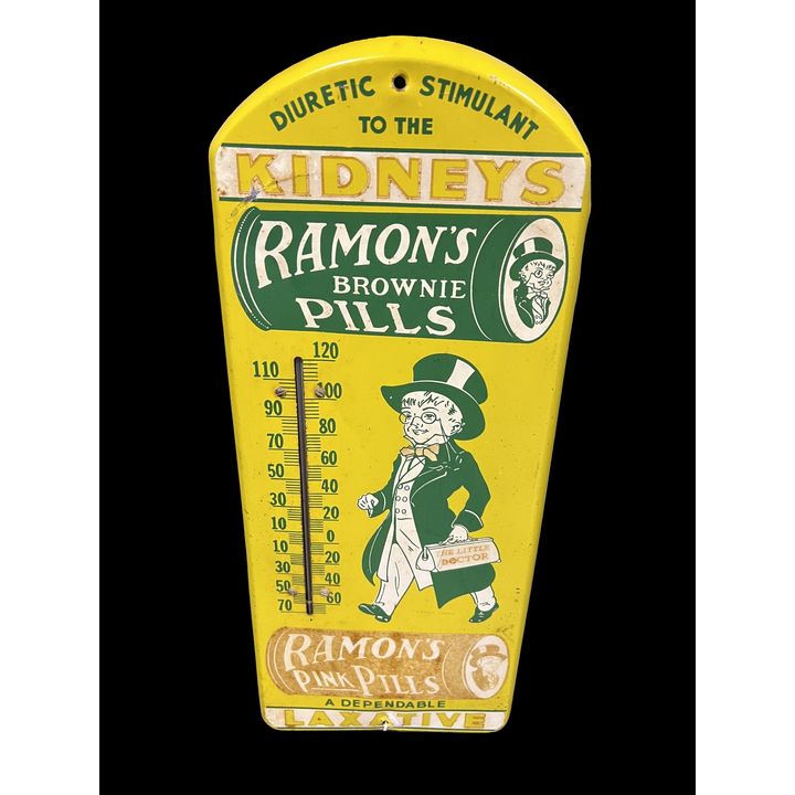 Unusual Left Facing Ramon's Brownie Pink Kidney Pills Tin Metal Thermometer