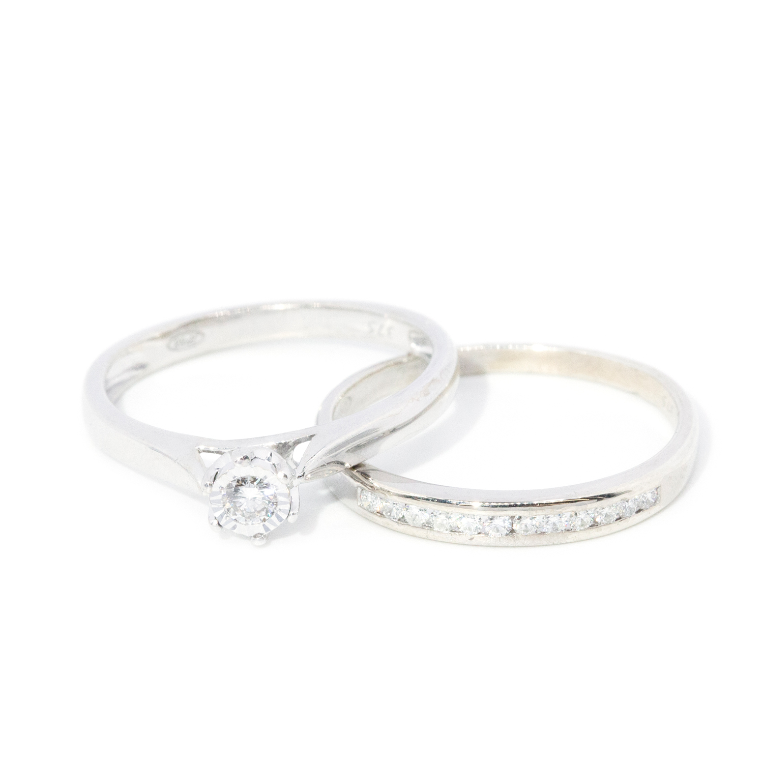 250 · Two 9ct Gold Diamond Rings