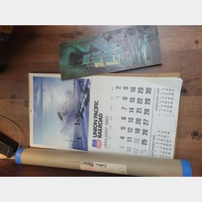 Union Railroad Calendars, antique telephone poster, and cabin plans