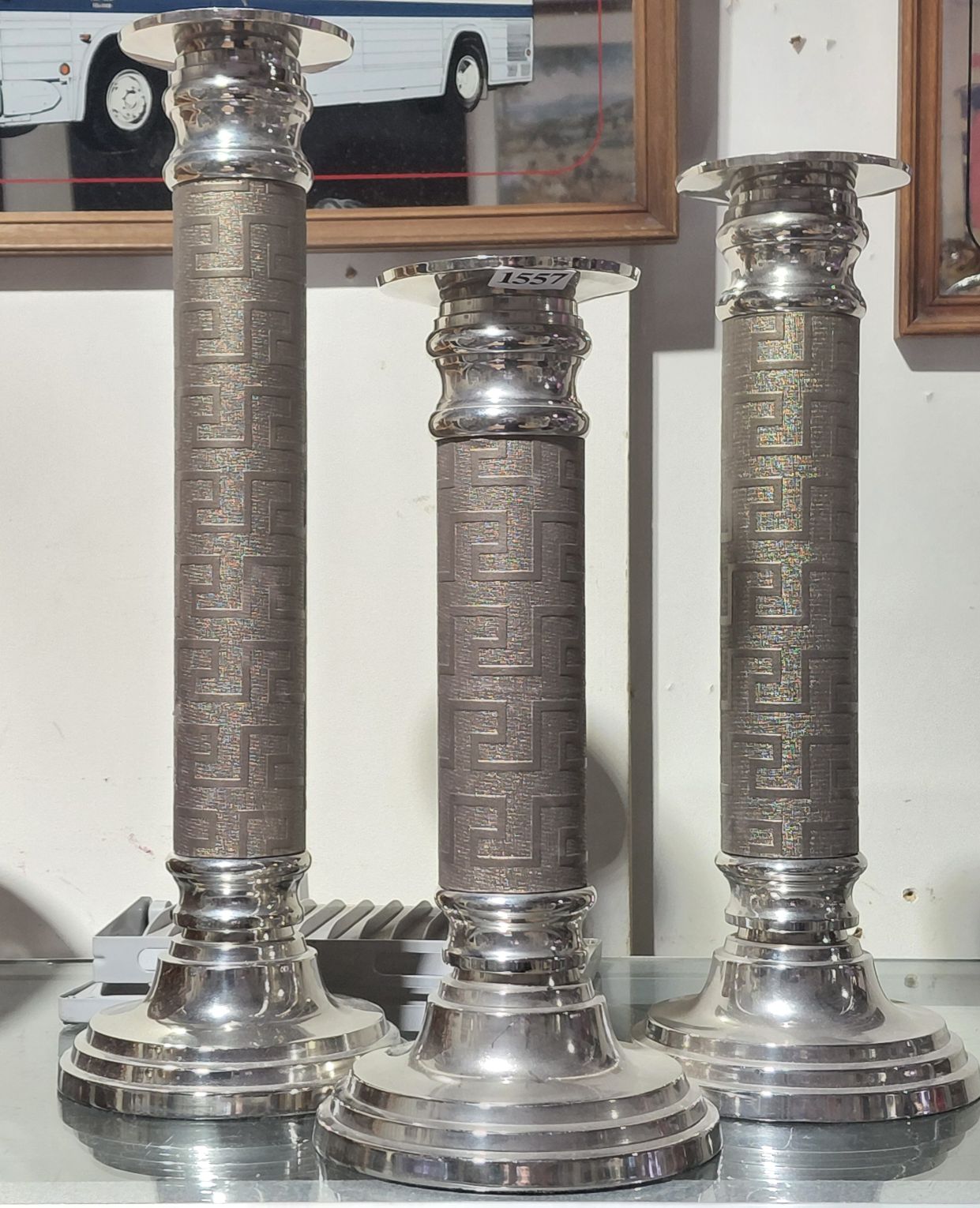 THREE MODERN CANDLE HOLDERS