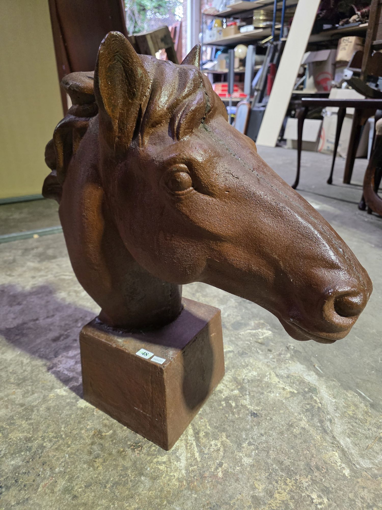 48 · HORSE HEAD STATUE