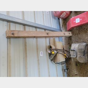 Concrete blocks, crock bowl dish and bowling ball