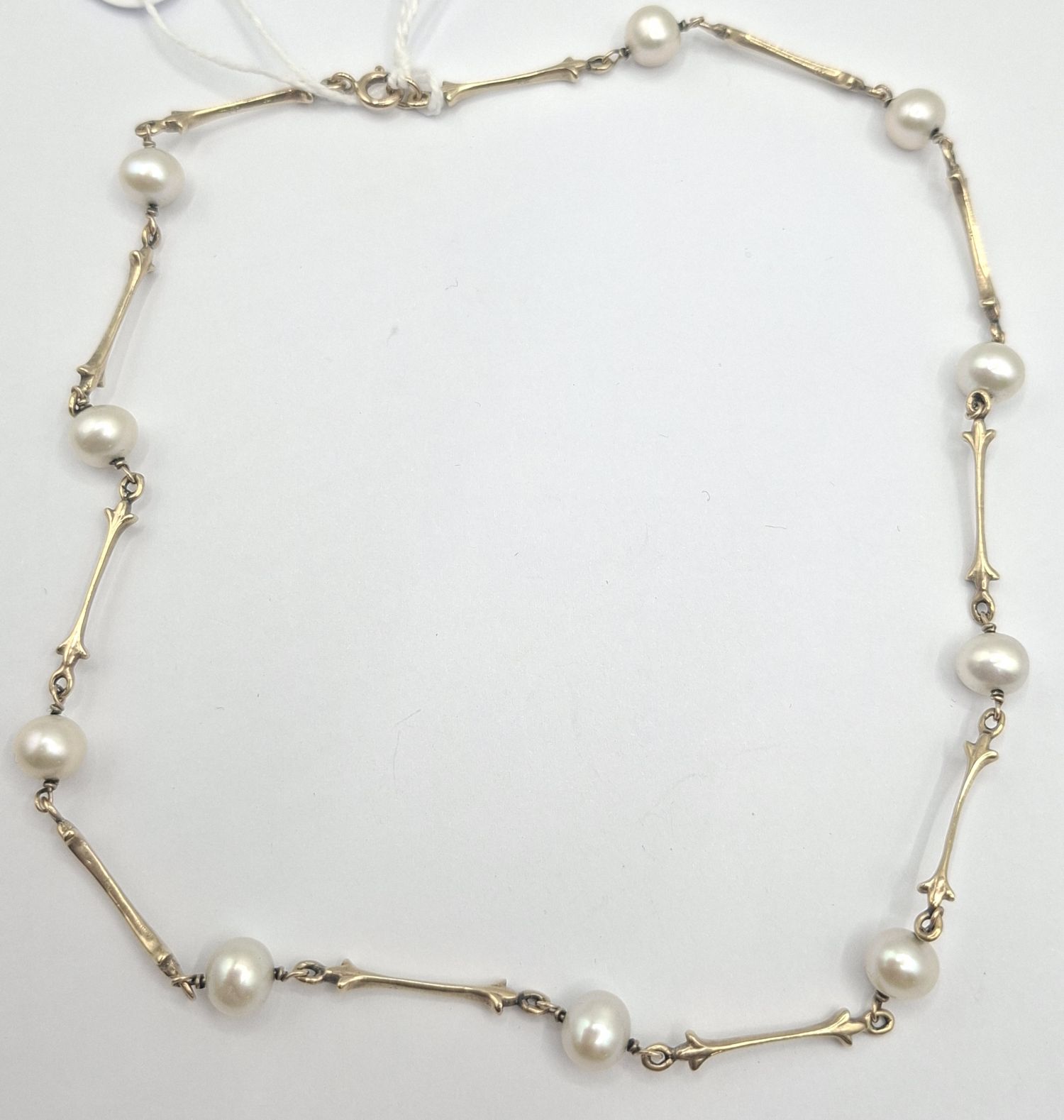 284 · 9CT SECTIONAL PEARL NECKLACE