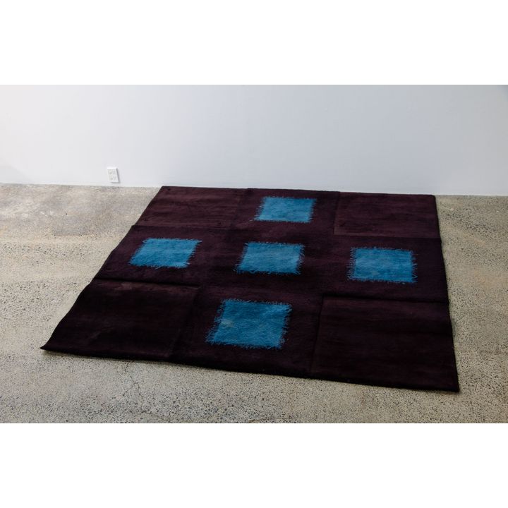 Dilana rug in NZ wool with design by Ralph Hotere