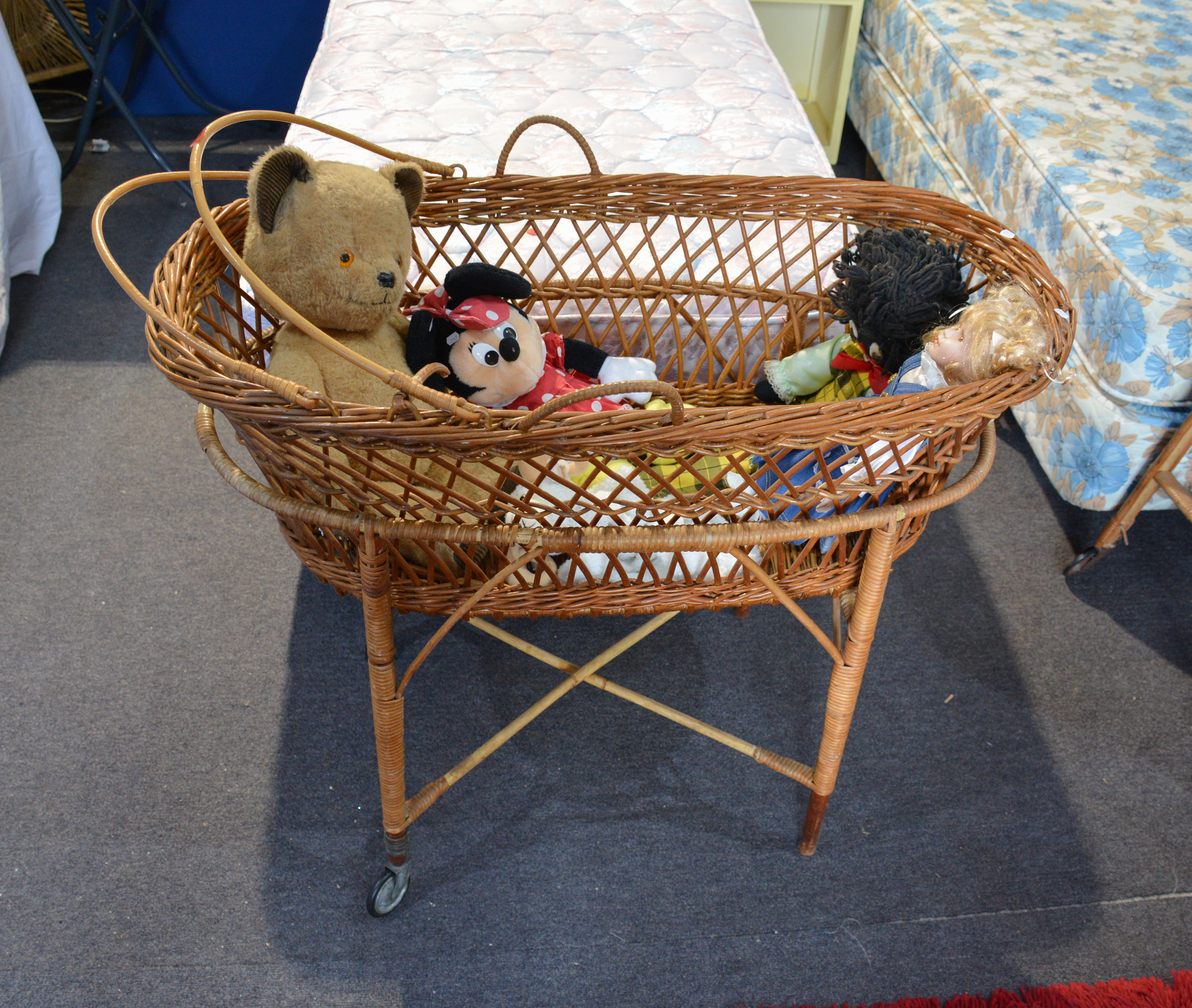 Cane Bassinet and Toys — sold at auction in New Zealand for $15