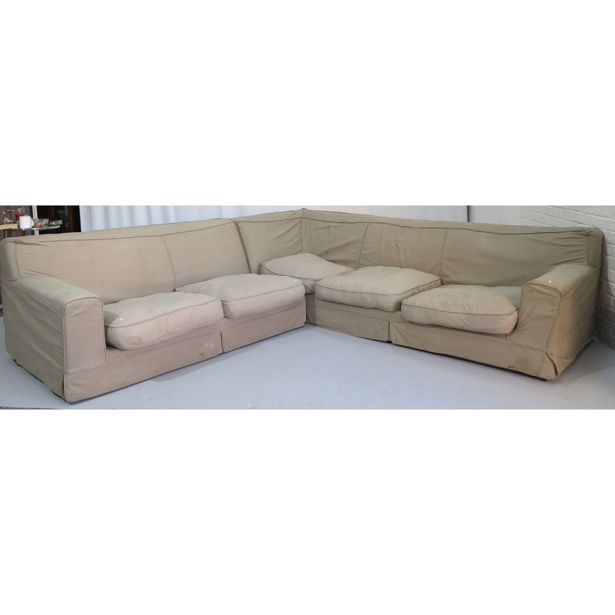 LARGE UPHOLSTERED CORNER SUITE with slip cover, needs a clean