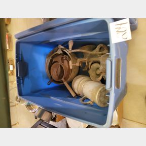 Large tote of meat grinders and other metal items