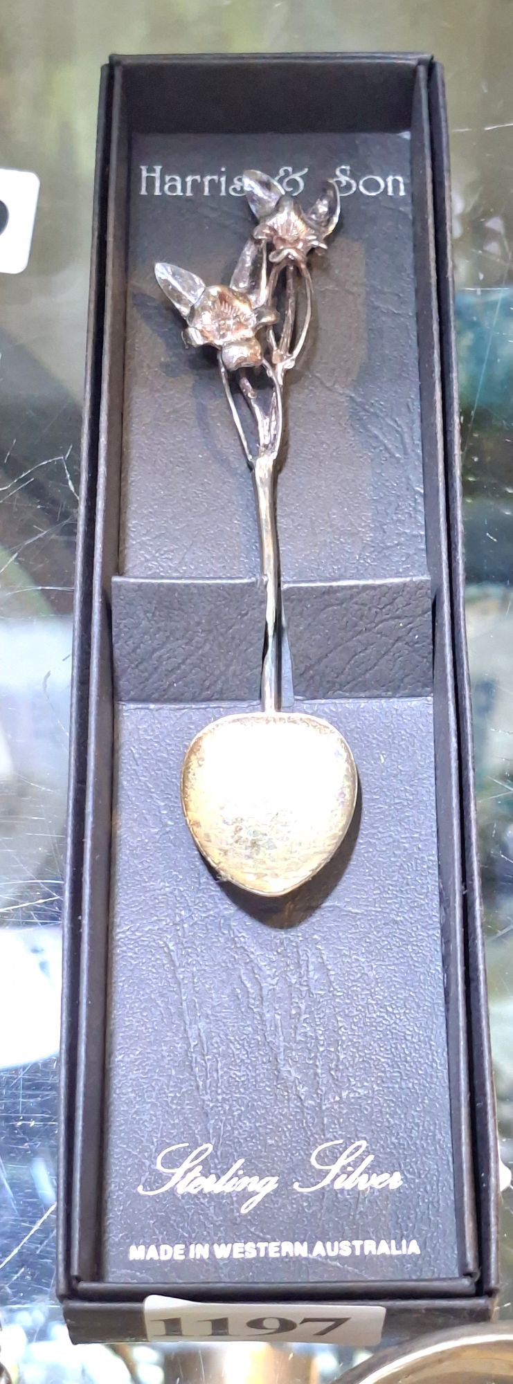 1197 · HARRIS AND SONS SILVER FIGURAL SPOON