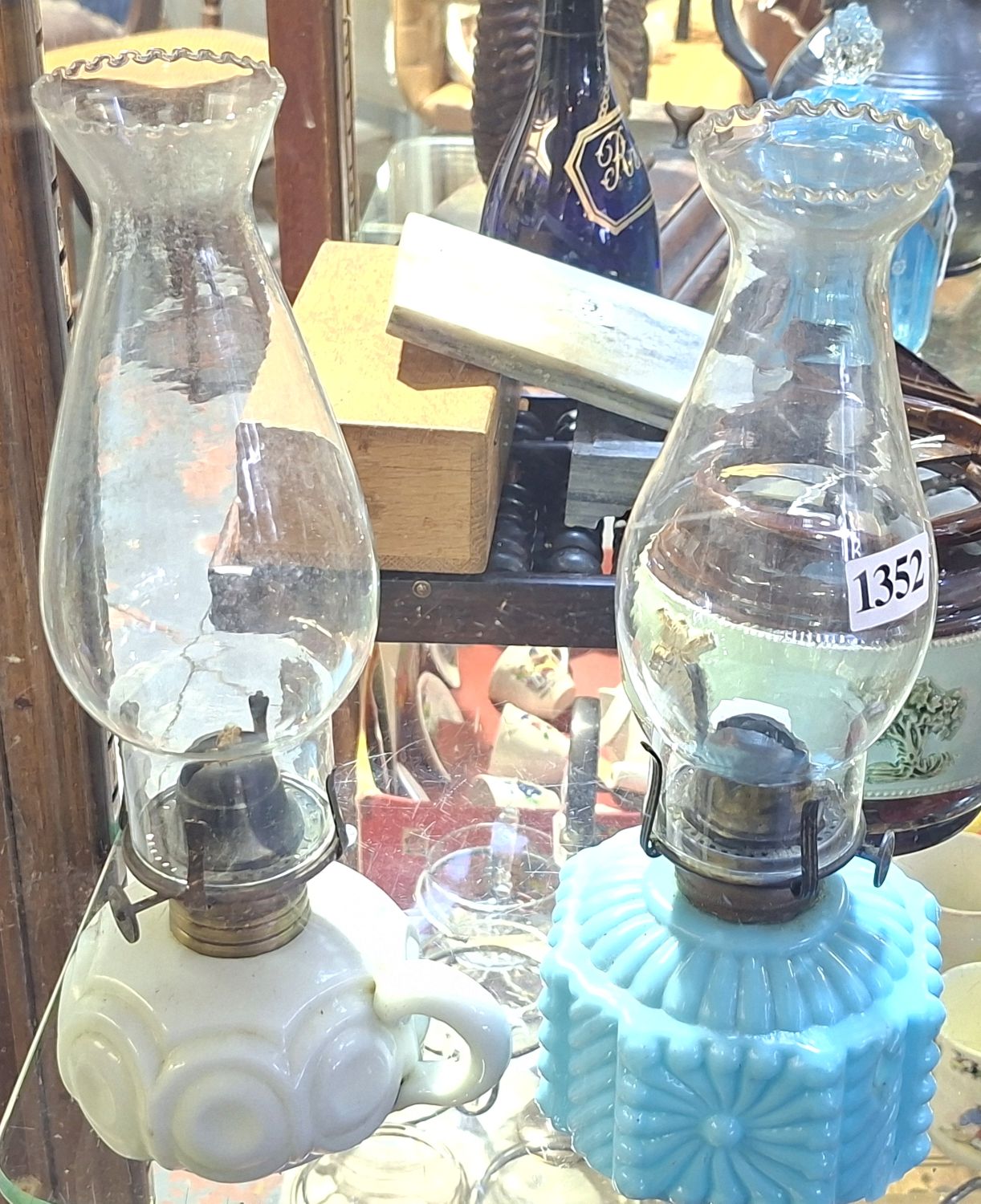 MOULDED BLUE GLASS AND WHITE GLASS FINGER LAMP