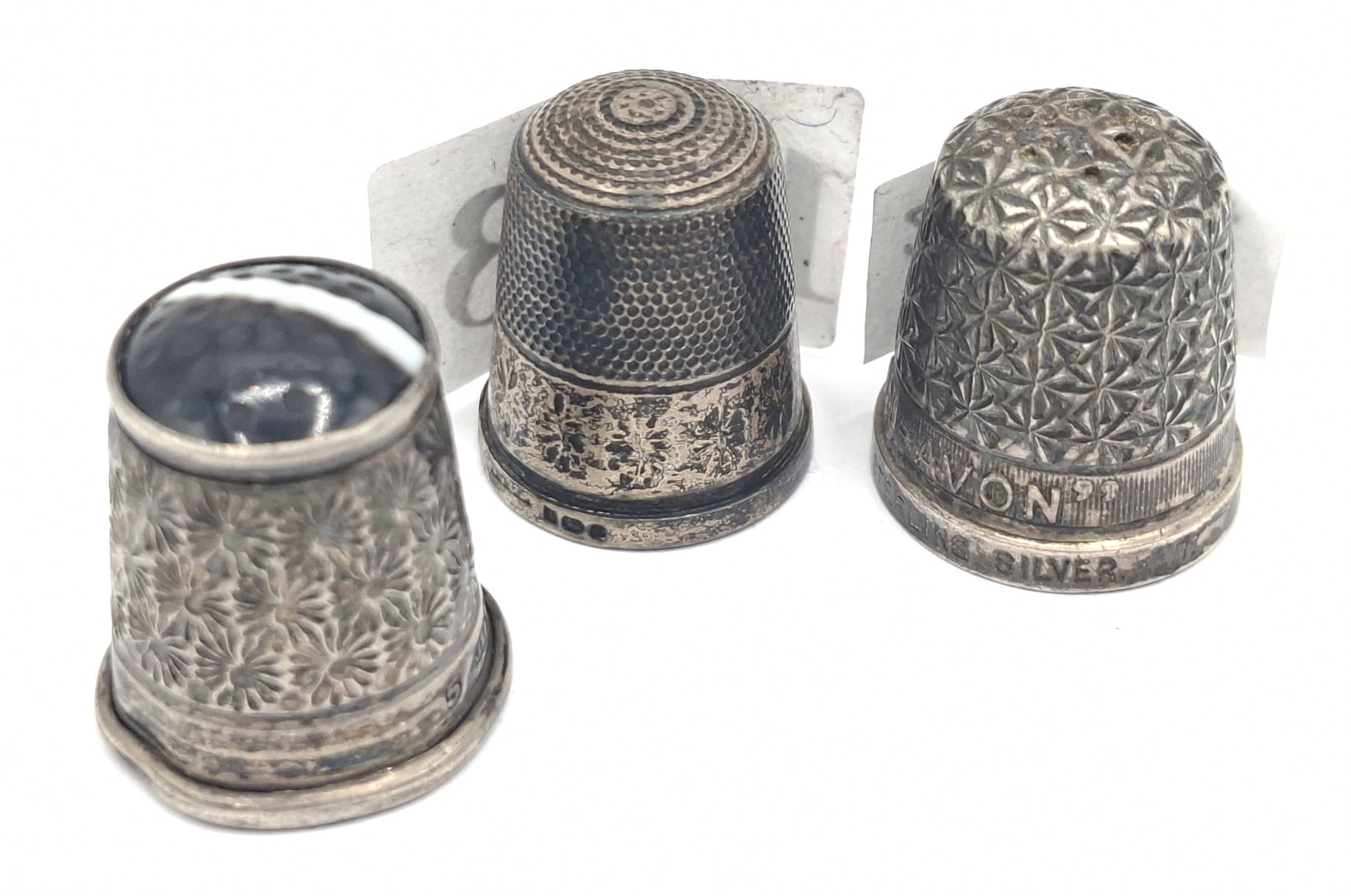 Three Silver Thimbles