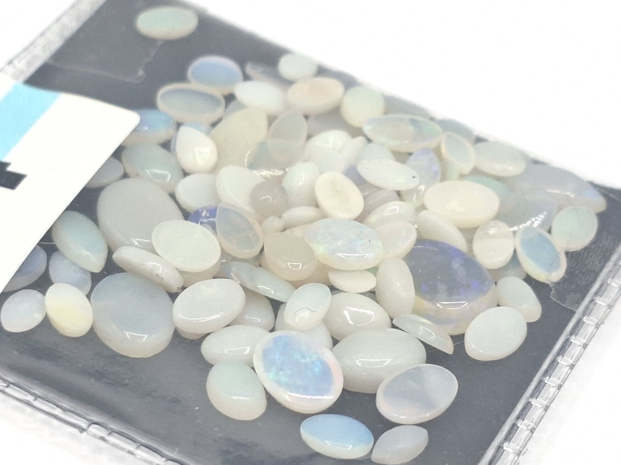 64 · OPAL SOLIDS GEMSTONES