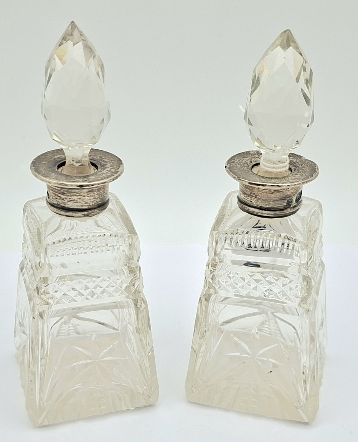 66 · A PAIR OF EDWARDIAN PERFUME BOTTLES