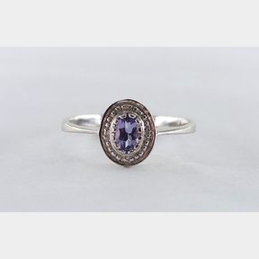 0.260CT TANZANITE + DIAMONDS IN WHITE GOLD RING
