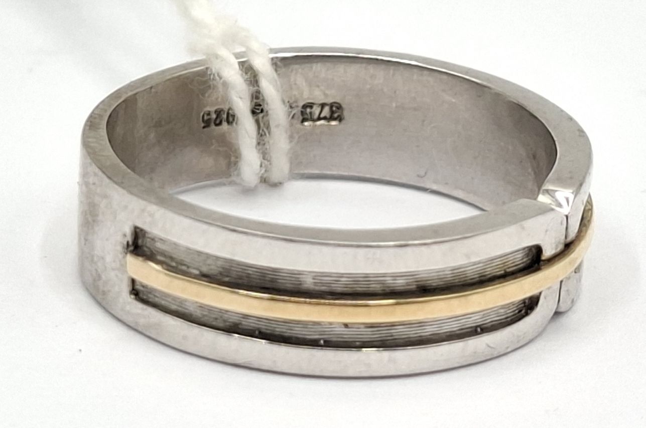 1100 · STERLING SILVER AND GOLD RING
