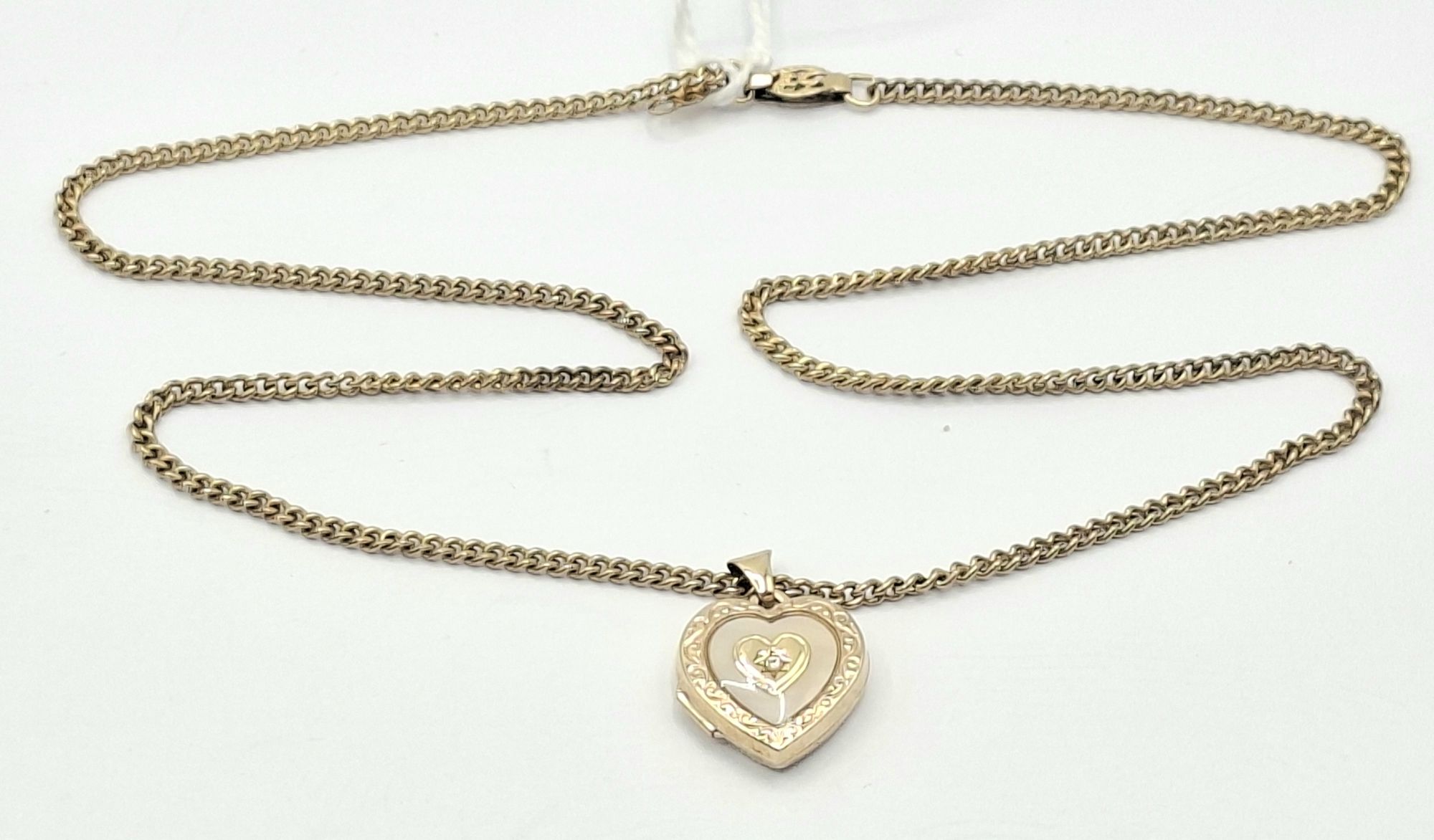 1125 · 9CT GOLD LOCKET PENDANT