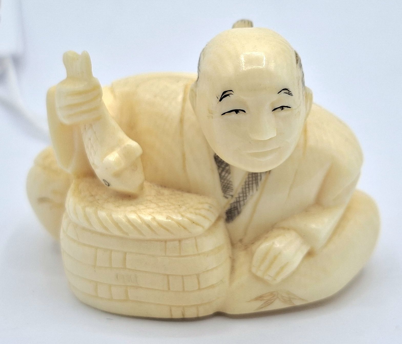 79 · ANTIQUE JAPANESE IVORY NETSUKE