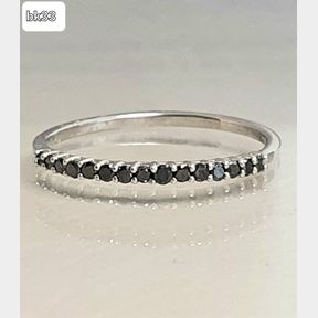 WHITE GOLD ETERNITY BAND WITH 15 BLACK DIAMONDS