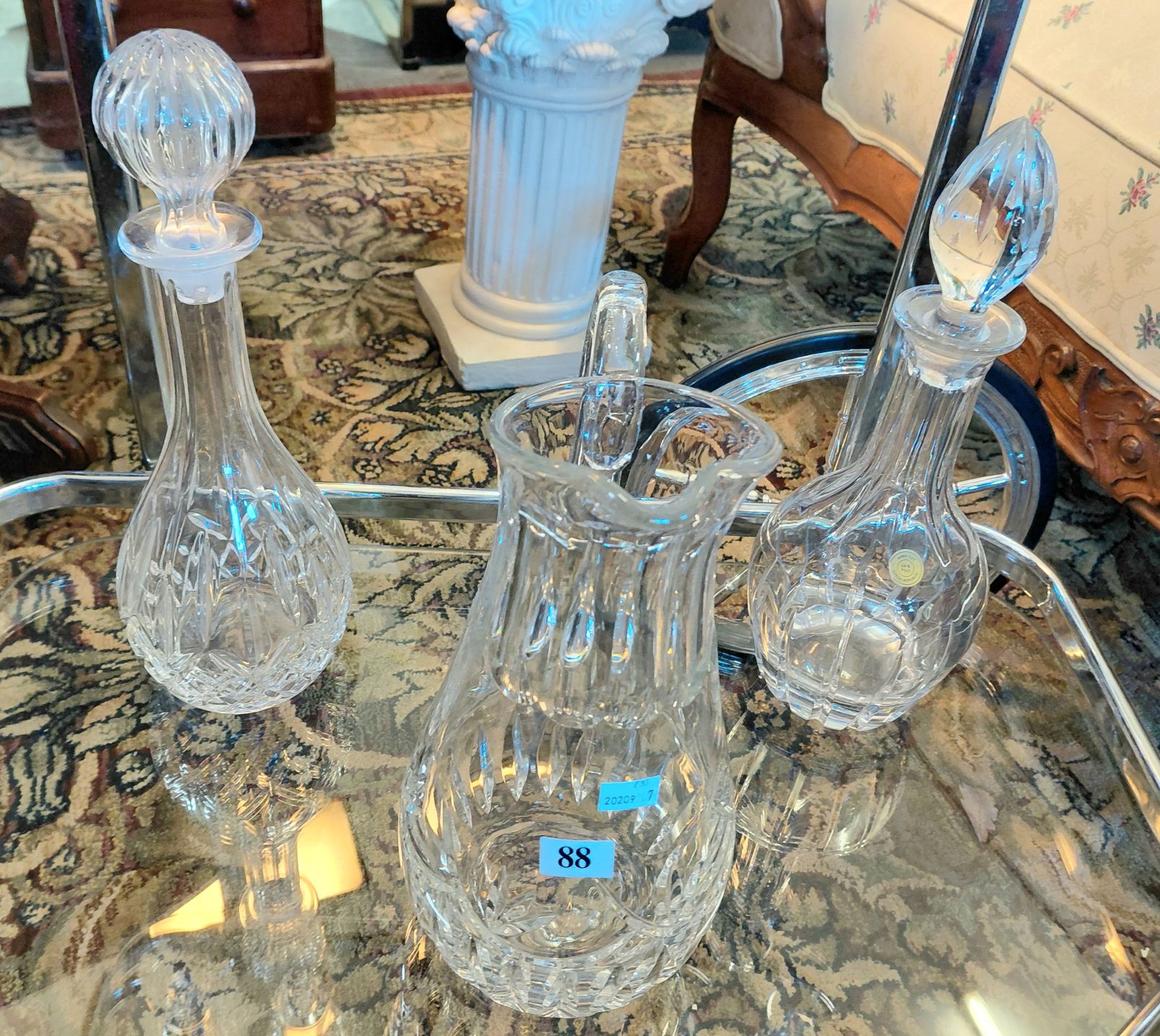 88 · CRYSTAL DECANTERS AND WATER JUG