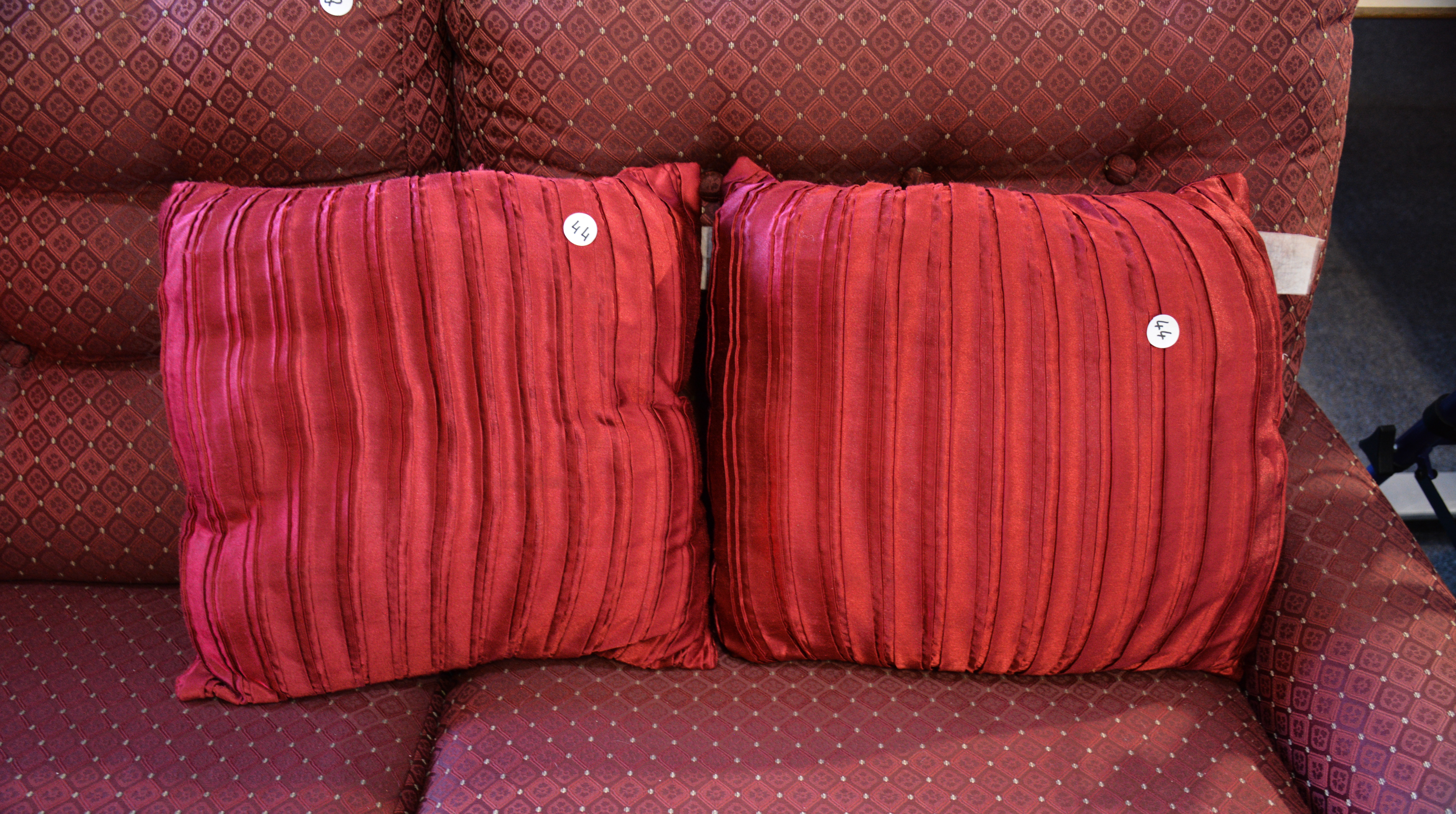 Red Satin Cushions x 2 — sold at auction in New Zealand for $5