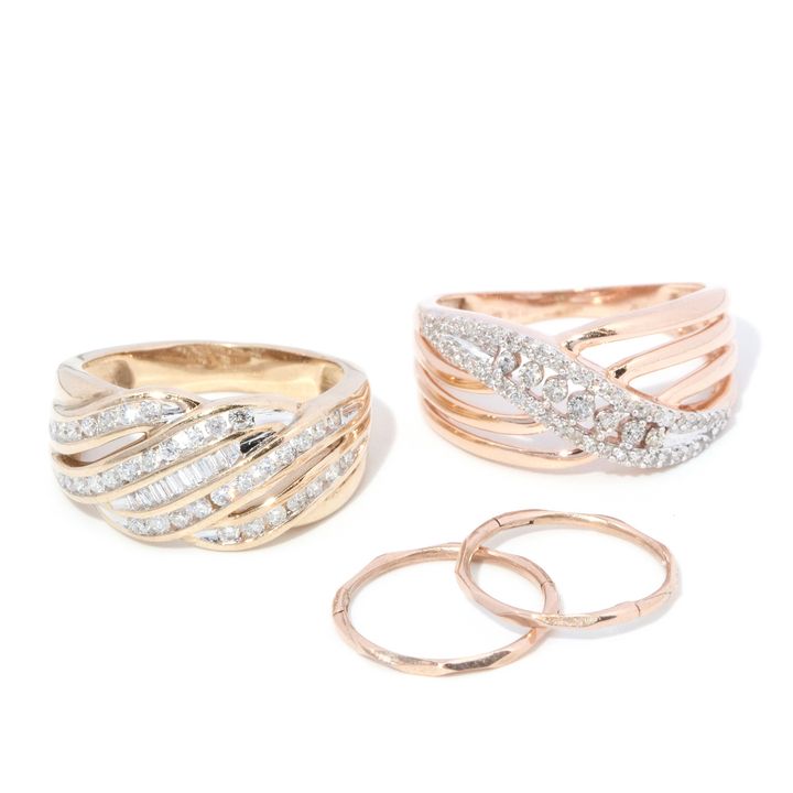 Two gold rings and earring set
